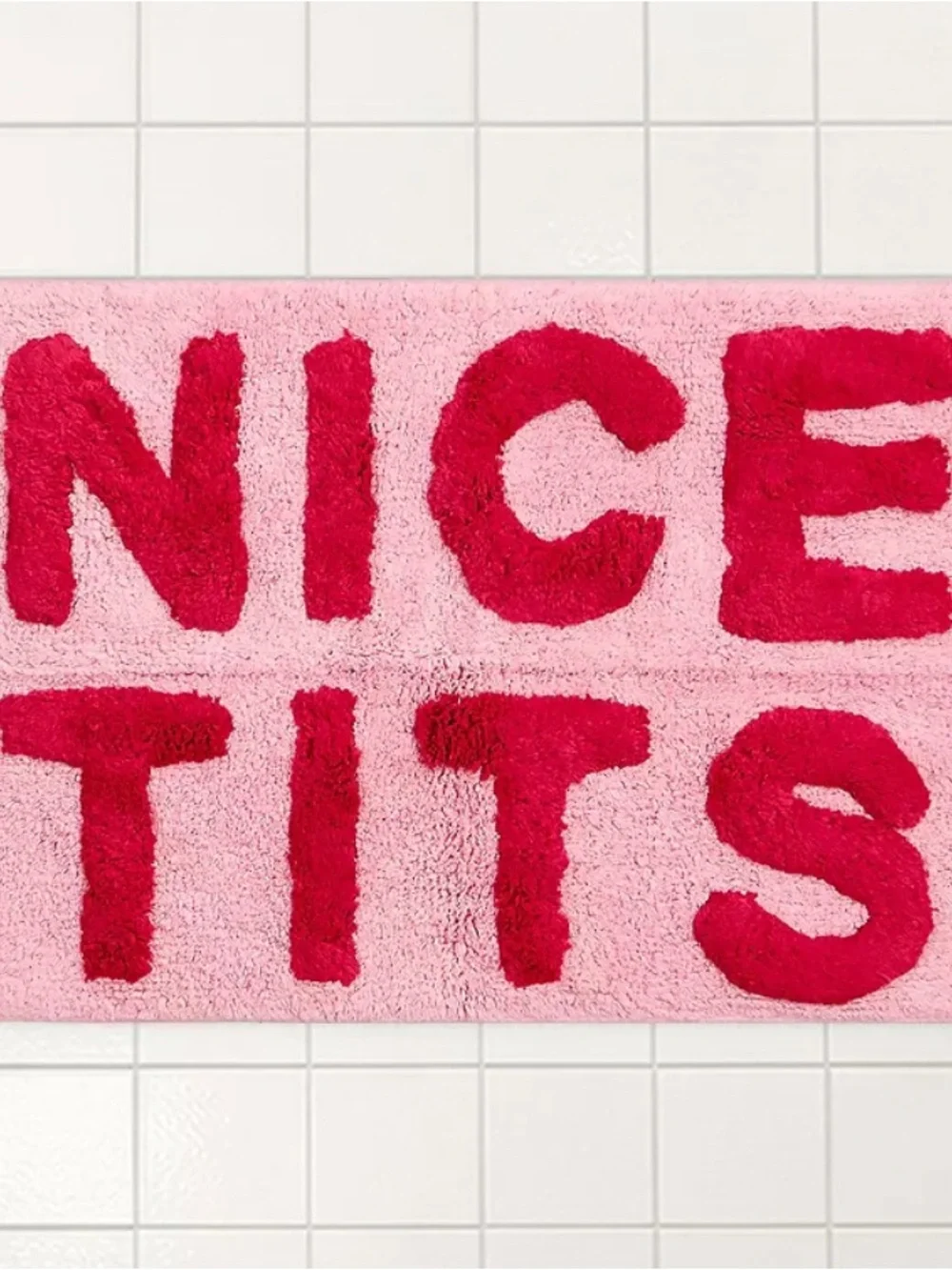 Urban Outfitters Pink Bath Mat with Bold Red Lettering Area rug carpet bathroom